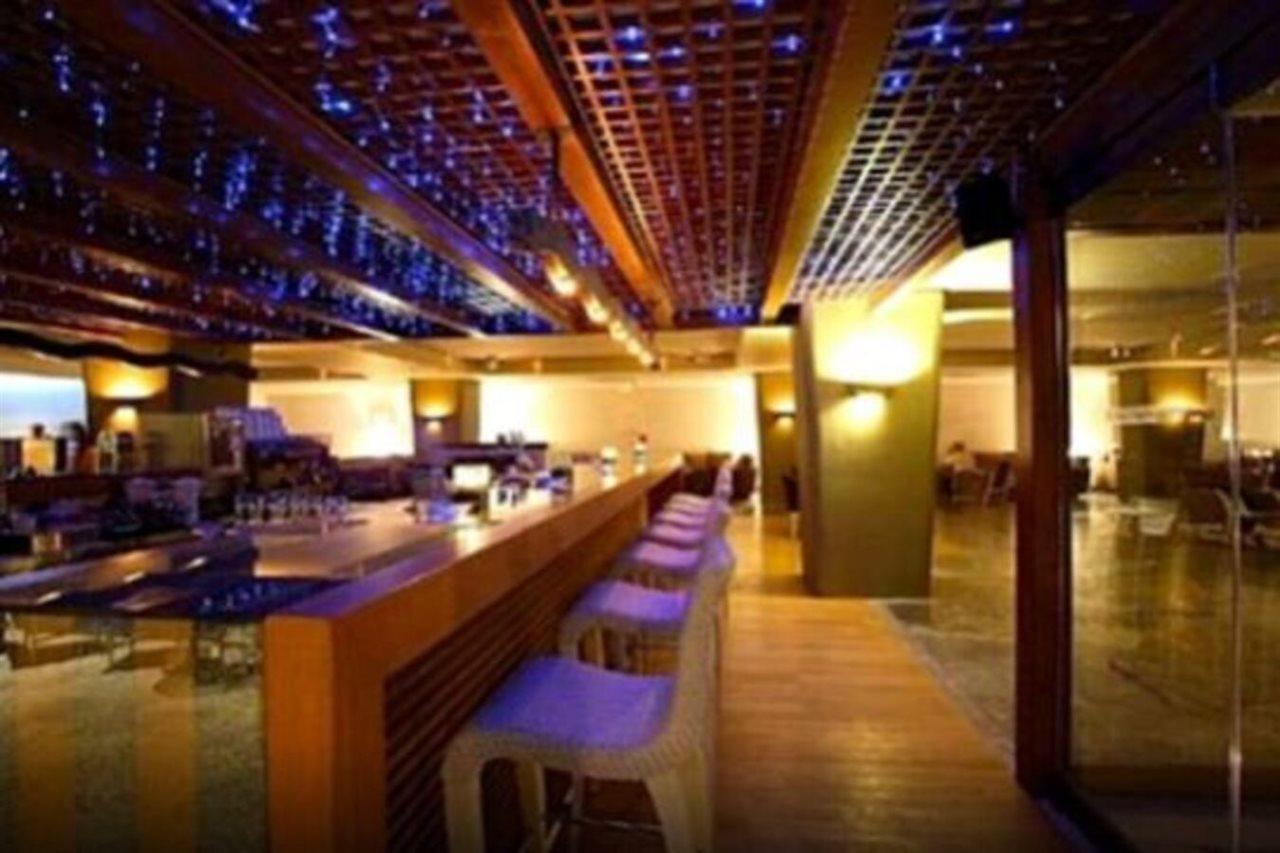 Sitia Beach City Resort & Spa Kültér fotó The bar at the 101 bar